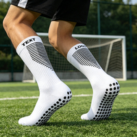 Chaussettes de football antidérapantes personnalisées en coton tricoté pour hommes