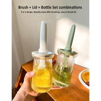 Bouteille distributrice d'huile 2 IN 1 avec brosse en silicone pour la cuisson de la sauce au vinaigre, du barbecue et de la friture.