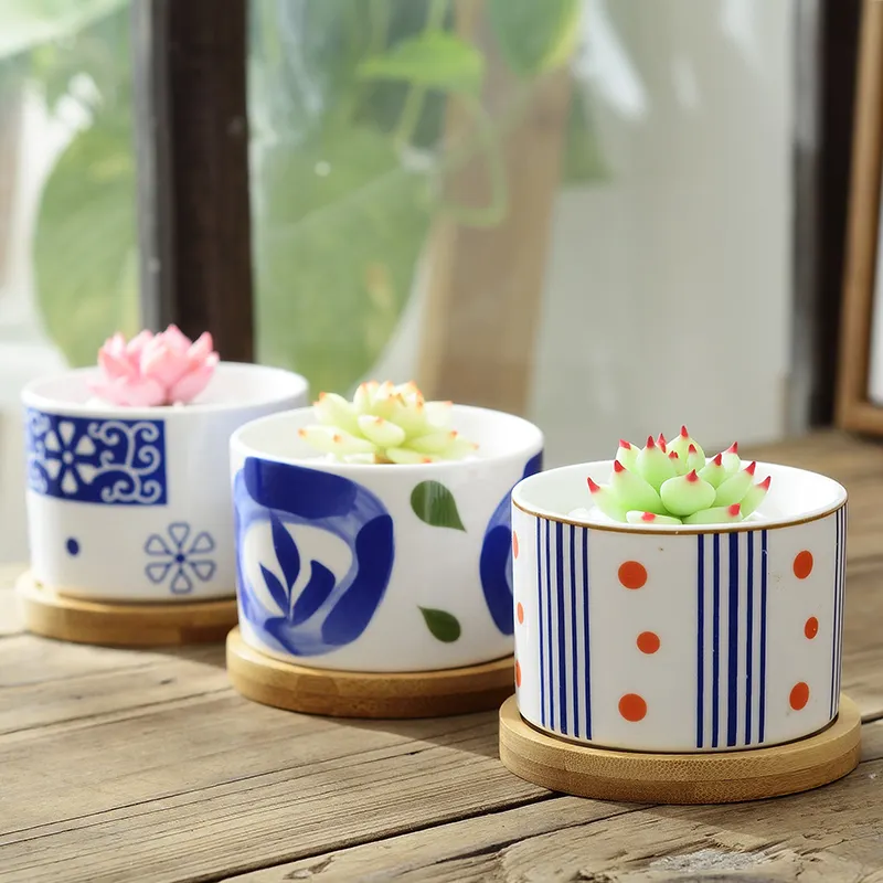 Vente en gros de pots de plantes ronds mignons au design nordique, petits pots de fleurs blancs en céramique avec plateau en bambou