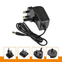 Adaptateur secteur AC/DC interchangeable 6V 12V 24V 12W Prise US EU UK AU 5.5*2.1mm CE FCC RoHS pour petits appareils électroniques OEM