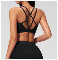 Soutien-gorge de yoga à bretelles croisées et dos élégant avec coussinets amovibles, ultra-doux et respectueux de la peau, haut de fitness très élastique pour femme