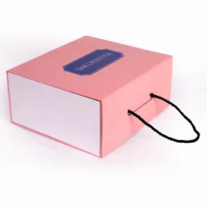 Custom LOGO pink packaging gift paper magnetic boxes printing with rope handle for luxury clothing brand packing