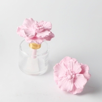 Bouteille ronde en verre de 50ml parfumée porcelaine fleur arôme plâtre désodorisant maison céramique parfum huile roseau diffuseur vente en gros