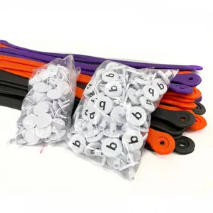 Hebillas de accesorios para bolsos de diseño OEM ODM de fabricante, accesorios para bolsos de playa de silicona de goma, hebillas con botones para bolsos de playa personalizadas
