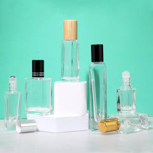 Bouteille en verre vide <span class=keywords><strong>de</strong></span> 3ml 5ml 10ml 20ml 30ml avec rouleau d'huiles essentielles <span class=keywords><strong>de</strong></span> <span class=keywords><strong>parfum</strong></span> à bille roulante sur bouteille avec bouchon en or et argent - Product Image 1