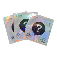 Sac d'emballage cadeau surprise coloré personnalisé PVC vide point d'interrogation film laser sac aveugle avec motif imprimé