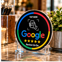 Plaque NFC noire premium pour avis Google, ronde, en acrylique, avec technologie de paiement sans contact.