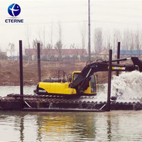 Excavatrice flottante amphibie électrique pour dragage de rivière avec bras de dragage hydraulique et flotteurs stabilisateurs pour zones humides et marécageuses