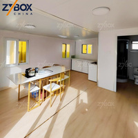 ZYBOX Maisons préfabriquées de luxe de 40 pieds, maison modulaire pliable, espace habitable de 75 m², texture bois, conteneurs extensibles, maison USA AU Canada