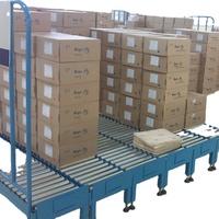 Wuxi Original convoyeur à rouleaux en acier galvanisé gravité normale pour usine de fabrication de magasin d'alimentation matériau de ceinture en caoutchouc à usage domestique