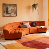 Canapé modulaire en velours orange incurvé pour salon moderne