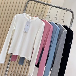 Nouveau design 2026 AL Printemps/Été T-<span class=keywords><strong>shirt</strong></span> <span class=keywords><strong>femme</strong></span> uni côtelé à <span class=keywords><strong>manches</strong></span> <span class=keywords><strong>longues</strong></span>, élastique, amincissant, pour le yoga, le Pilates et comme sous-vêtement de sport - Product Image 1