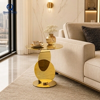 Table basse ronde de couleur personnalisée haut de gamme nouvelle personnalité créative Base en acier inoxydable Table d'appoint en miroir en titane