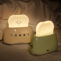 Lampe de nuit minimaliste à LED blanc chaud, alimentée par piles, en forme de grille-pain, avec matériau en silicone pour une utilisation sur le chevet ou sur un bureau