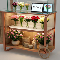 Stand de présentation mobile personnalisé pour fleurs avec étagères en verre et éclairage LED pour kiosque de fleuriste