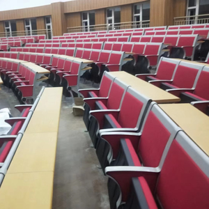 เก้าอี้เรียนแบบมีบันไดสีแดงทันสมัย โต๊ะเขียนหนังสือแบบมีที่นั่งติดตั้งถาวร ทนทาน เหมาะสำหรับห้องบรรยายในมหาวิทยาลัย - Product Image 1