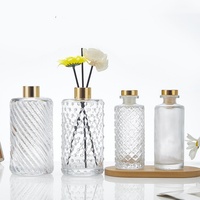 Bouteille de diffuseur de luxe 100ml 150ml Bouteille de diffuseur en verre à rayures avec bâton