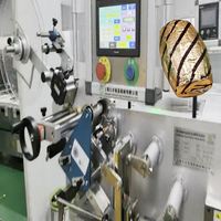 Équipement d'emballage en feuille ondulée pour chocolat en forme de tonneau, haute production, thermoscellage entièrement automatique, personnalisable