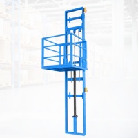 Ascenseur fixé au mur vertical hydraulique d'ascenseur de cargaison de table élévatrice hydraulique de marchandises pour l'entrepôt
