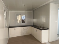 Maison conteneur préfabriquée mobile extensible de 20 pieds et 40 pieds avec salon, cuisine et chambre pour hôtels et commerces