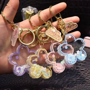 <b>Floating</b> Sakura Cherry Blossom Keychain, Liquid Oil Acrylic Quicksand Pendant, Cute Couple Gift for Car Keys Bag Jewelry - Product Image 1