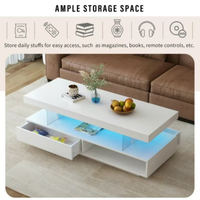 Table basse lisse avec bande lumineuse LED, grand espace de rangement à l'avant et à l'arrière des quatre tiroirs