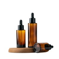 Flacon compte-gouttes en verre brun 20ml 30ml 40ml 50ml 60ml à épaule plate pour sérum et huile essentielle avec col doré et bulbe noir, en vrac