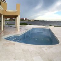 Dalles de sol extérieures en pierre naturelle UnionStone, pierre calcaire beige Myra, finition polie, pour villa, piscine