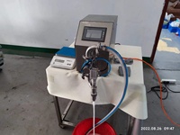 Machine de remplissage de bouteilles semi-automatique Machine de remplissage de bouteilles de boissons semi-automatique