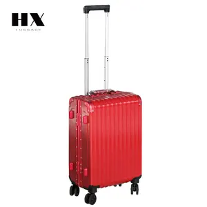 מזוודות מעטפת קשיחה אדומה ABS/PC, אווירה חגיגית, קופסת מסגרת מאלומיניום, נושאת עומס חזקה, אופנתית וניתנת להתאמה אישית