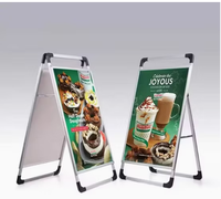 Panneau publicitaire pliable double face en forme de A, robuste, avec glissière latérale, pour l'affichage d'affiches publicitaires