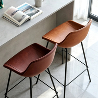 Tabouret moderne et épuré pour la maison, en cuir orange, style classique et tendance, luxe discret, chaise de bar nordique