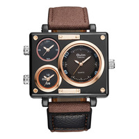 Reloj de Pulsera OULM 3595 para Hombre, Diseño Deportivo Vintage, Correa de Lona Marrón, Cuarzo, 3 Zonas Horarias, Pantalla Analógica