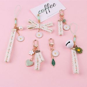 Cartoon Japan Small Flower Keychain for Women <b>Key</b> Chains <b>Ring</b> Bell Ribbon Car Bag Pendent Charm Airpods Accessories Gift - Product Image 2