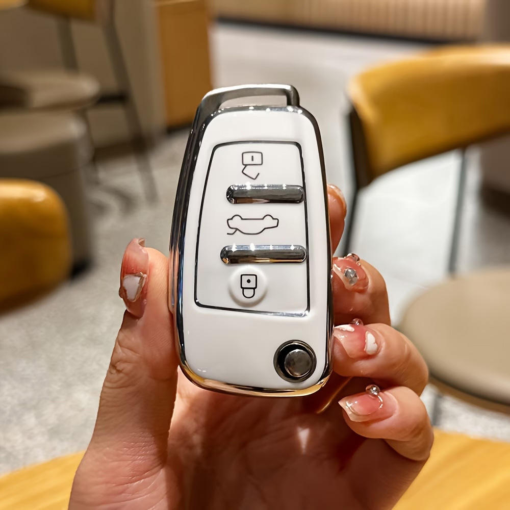 Blanc style D à bords argentés