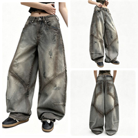 Pantalon en jean délavé effet dégradé avec patchwork à lames courbes, coupe droite ample, style streetwear, taille haute, jambe large