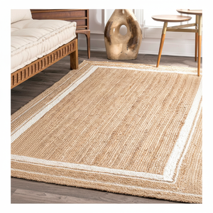 Alfombra rectangular clásica de yute con borde tejido blanco. Estilo neutro y atemporal. Disponible a precios de mayorista. - Product Image 1