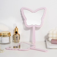Cermin Kosmetik HD Portabel dengan Bingkai Kaca & Logam Pegangan Plastik Genggam dengan Lampu Logo Kustom untuk Riasan Wanita