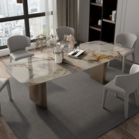 Table à manger moderne de luxe en marbre naturel Pandora avec base en acier inoxydable plaqué bronze Ensemble de salle à manger