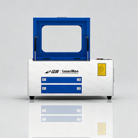 Station de travail laser de bureau 100W avec plateforme réglable en hauteur pour le traitement du bois et de l'acrylique, conception compacte pour les startups et la production en studio