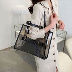 Sac fourre-tout de plage et de voyage transparent en PVC avec poignée en PU, grande taille, étanche, pour femmes, vente en gros - Product Image 5