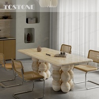 Table à manger en marbre travertin naturel super blanc Tostone Designer, base en pierre multi-sphérique pour la décoration de la salle à manger à domicile