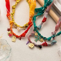Nouveau Collier Pendentif Tendance Bohème en Soie avec Breloques Coquillage, Étoile de Mer et Tournesol – Bijoux de Mode pour Femme