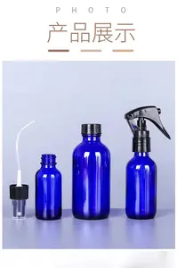 विभिन्न आकारों में नई सबसे अधिक बिकने वाली थोक नीली बोस्टन गोल कांच की बोतलें, काले पंपों से सुसज्जित
