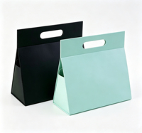 Boîte cadeau rigide sur mesure, boîte en carton trapézoïdale aux dimensions personnalisées avec poignée intégrée pour les commandes personnalisées d'entreprise