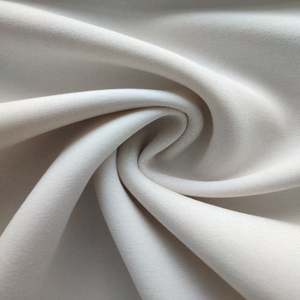 Tela de punto 100% algodón, color blanco sólido, suave, elástica y agradable al tacto, para prendas de vestir, venta al por mayor. - Product Image 1