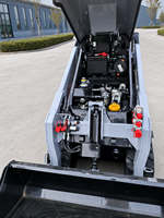 Mini-chargeuse compacte haute performance sur roues pour projets de construction et d'aménagement paysager multifonctionnels