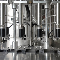Meilleure machine semi-automatique pneumatique de 200 ml pour flacons de parfum, d'huile moteur, de lotion pour eau de toilette, 4 têtes, haute précision