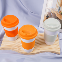 Tasse en céramique de couleur personnalisée de haute qualité au design anti-brûlure tasse à café avec couvercle en silicone