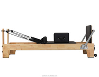 Vente directe usine – Machine de Pilates Reformer professionnelle réglable avec poulies silencieuses en caoutchouc et bois pour studio de Pilates commercial